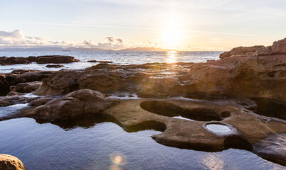 Sunset Over Rocky Coastline in Port Renfrew, Vancouver Island, BC, Canada