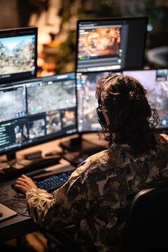 Gamer in camo engaged in an intense multiplayer battle