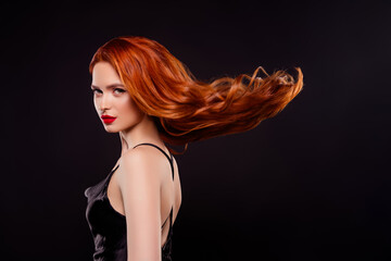 Naklejka premium Photo of sexual stunning gorgeous fashion lady fluttering hair spa salon wear dress isolated on black color background