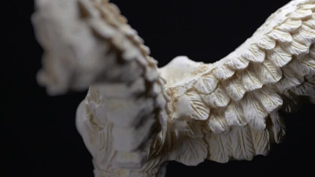 Ancient Greek Nike Statue Samothrace Island Wings and Body Details Close-up with Black Background
