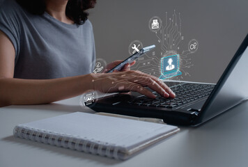 Technical support customer service with AI technology concept. Woman uses laptop with VR screen to support customer icon, online it support, call center and customer service help business.