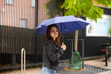 Rainy day walk with umbrella.