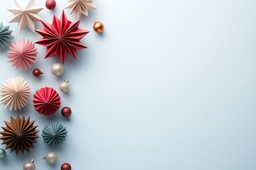 Border made of paper decoration. Origami New Year ornaments on soft pastel background.