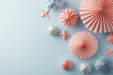 Border made of paper decoration. Origami New Year ornaments on soft pastel background.