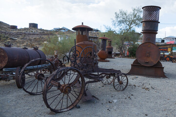 Rusted old mining equipment in a junkyard