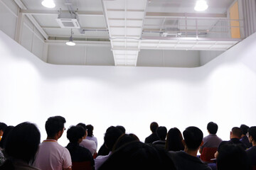 Audience in corporate business meeting conference event hall, listener in traning workshop
