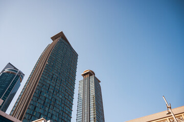 image of tall skyscrapers with wide angle sky below