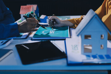 ESG environmental social governance display on laptop on eco-friendly company meeting with business...
