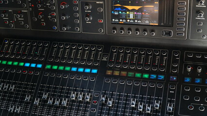 Fototapeta premium Black audio sound mixer with slider buttons and display