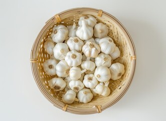 Garlic Cloves in a Bamboo Basket