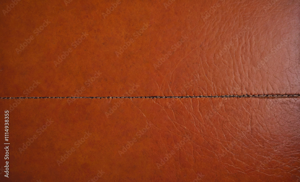 Poster Brown leather surface with a white line running down the middle. The line is about 1/4 of the way down the surface