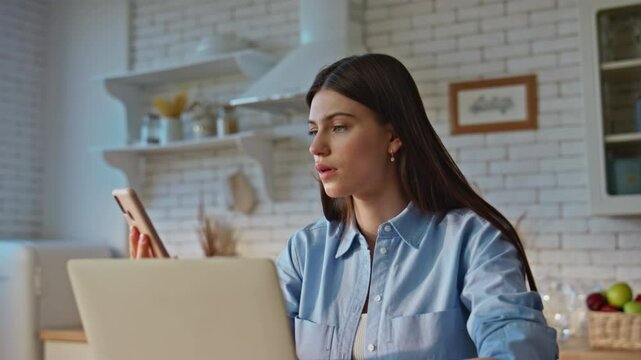 Businesswoman loser reacting fail checking phone notification at home closeup