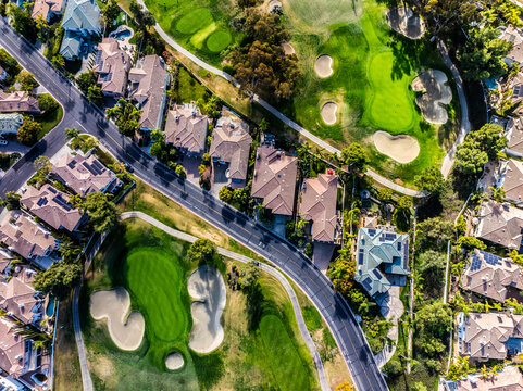 Aerial view of suburb houses and golf courses in Newport, California.t.