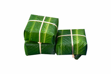 Vietnamese Chung Cake isolated on white background (Banh Chung, a traditional Vietnamese New Year's dish)