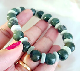 Elegant Green Jade Bracelet in Hand