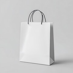 A Blank White Paper Shopping Bag With Black Handles