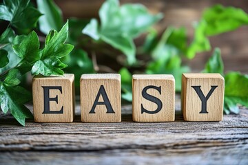 A simple image of wooden blocks spelling out the word EASY on a rustic wooden surface