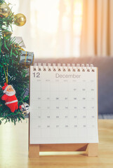 2025 Calendar desk and Christmas tree placed on business table, for Planner to plan agenda,...