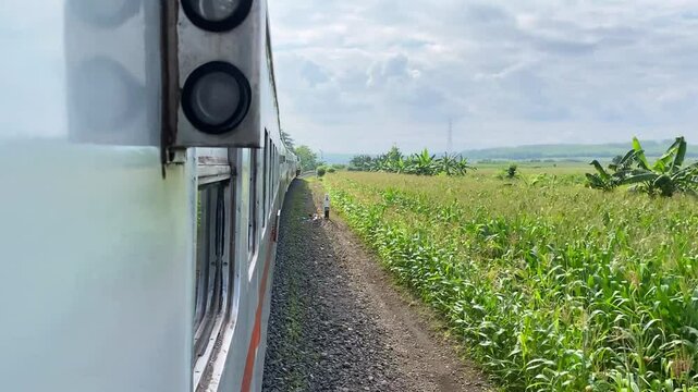 An outside view of a train swerving on the track