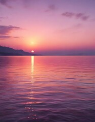 Obraz premium Soft pinks and purples of an Antalya sunset reflected in the calm sea, water, purple, reflection