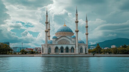 Fototapeta premium Majestic Mosque by the Lake Under a Cloudy Sky