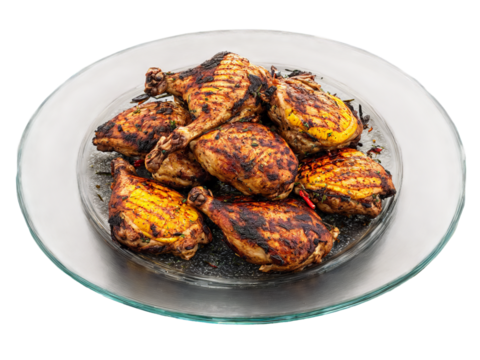 Jamaican jerk chicken spicy and grilled served on a transparent glass plate Caribbean heat