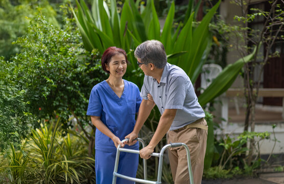 Nurse explaining procedure to patient . Nursing home service and elderly people health care. Elderly care concept.