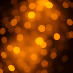 Fototapeta premium Golden glow lights on dark background