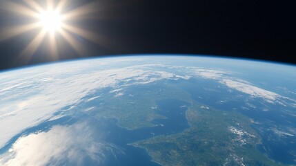Fototapeta premium Sunlit Earth from Space, showing land, clouds, and ocean.