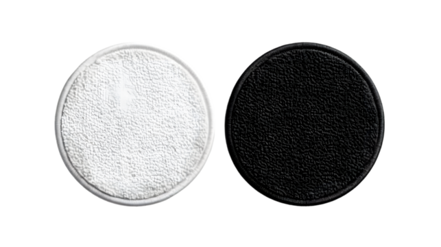 Blank black and white round embroidered patch mockup, top view isolated on a transparent background