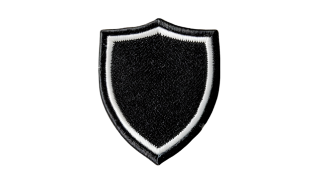 Blank black and white shield embroidered patch mockup, top view isolated on a transparent background