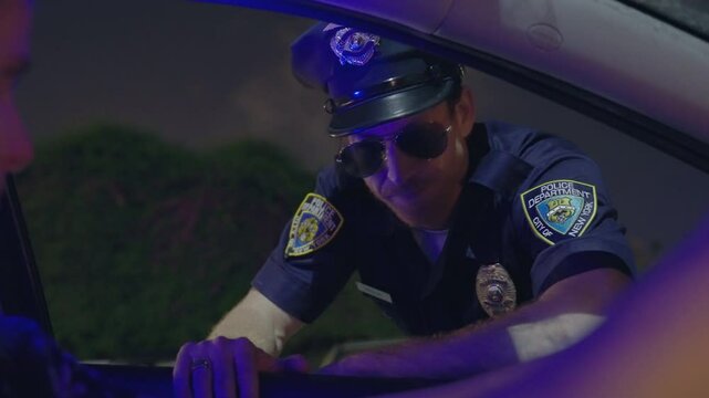police officer leans into a woman&rsquo;s car window, disappointed and upset during a conversation. Tense moment, concerned cop. Law enforcement, road safety, and officer-driver interactions. under arrest