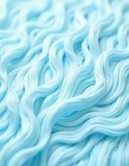 Obraz premium A close-up of soft, fluffy cotton fibers, ready for spinning.