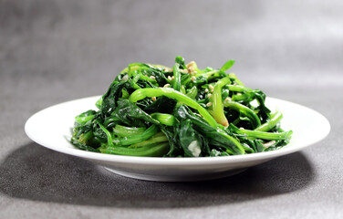 Spinach vegetables seasoned with salt and sesame oil. Korean style vegetable side dish.