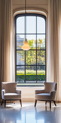 Fototapeta premium Elegant sitting area with large window showcasing vibrant outdoor greenery