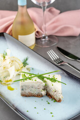 Creamy fish terrine with dill and radish garnish
