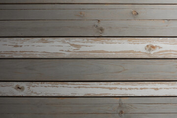 Obraz premium A wooden surface with a grainy texture and a white color