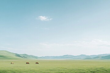 Majestic Horses Grazing in Expansive Green Fields Under Blue Sky