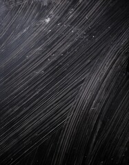 Obraz premium Close-up texture of a scratched black surface with curved abrasion lines and scuff marks, dark grunge background, rough and worn look, high detail, moody lighting.