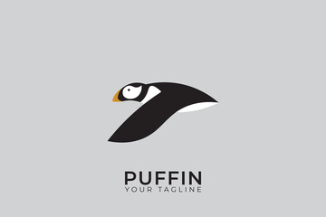 Puffin bird logo silhouette, simple and minimalist puffin logo.