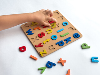 Colorful alphabet puzzle for early childhood learning and development