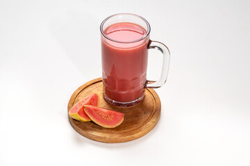 Refreshing Guava Smoothie With Sliced Guava on Wooden Tray Isolated