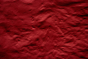 Crimson red colored abstract wall background with textures of different shades of red