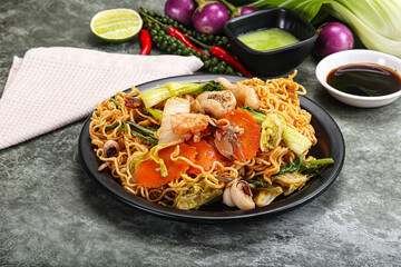 Asian cuisine - Fried noodles with seafood