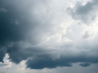 Obraz premium The sky is filled with thick and billowy storm clouds, stormy, rainy, gloomy