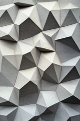 Fototapeta premium Interlocking Diamond Shapes in Varying Sizes and Shades of Grey Creating a Layered Minimalist