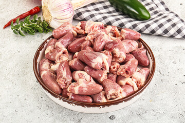 Fresh raw chicken hearts in the bowl