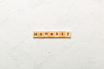 honesty word written on wood block. honesty text on table, concept