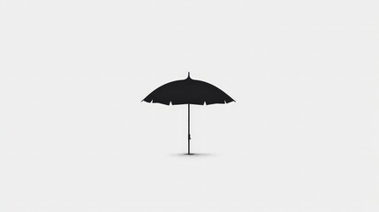 Obraz premium Minimalistic Black Umbrella Isolated on Light Background