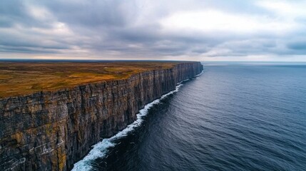 Obraz premium Wind turbine generators harnessing sustainable energy on cliffs